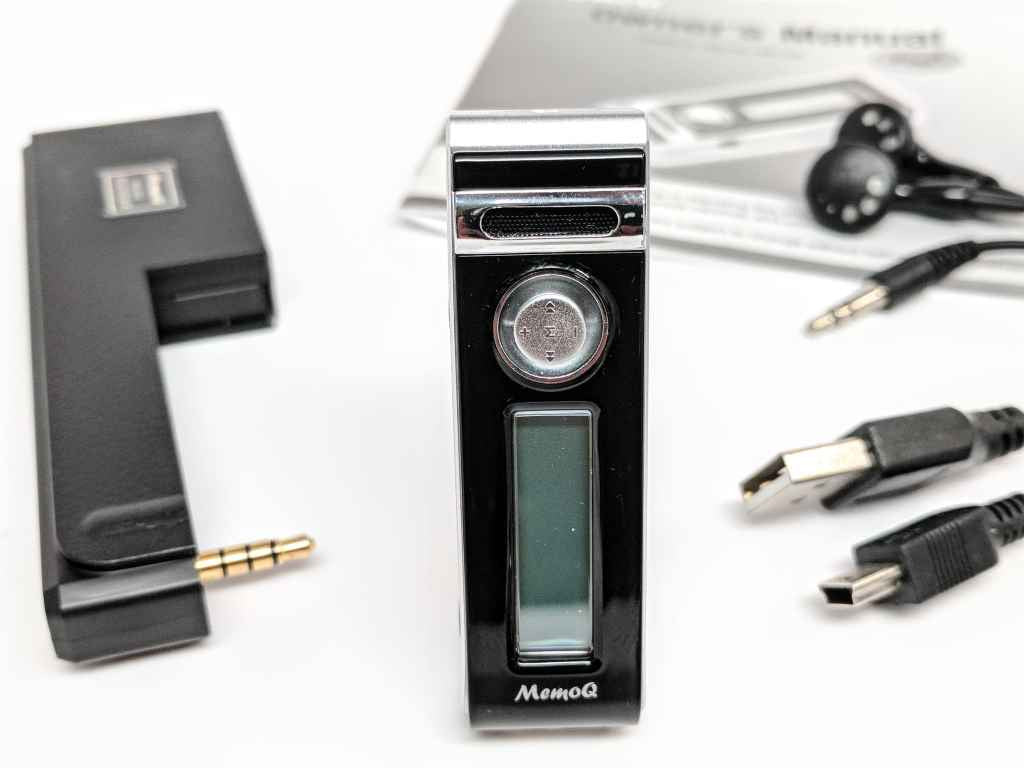 Micro voice recorder MV-7 shown in hand for size