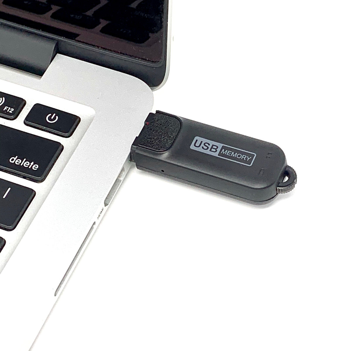 Small voice recorder VR-4 plugged into a computer USB port