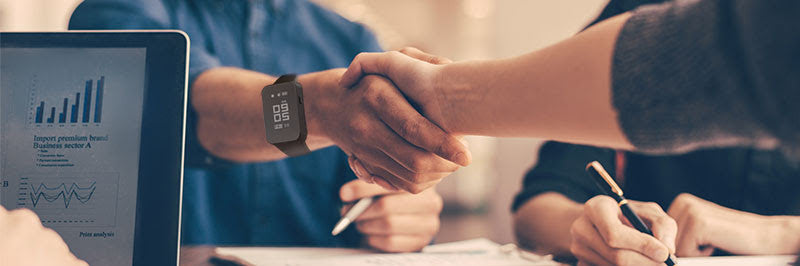 Audio recording wrist watch SR-600 shown in hand for size
