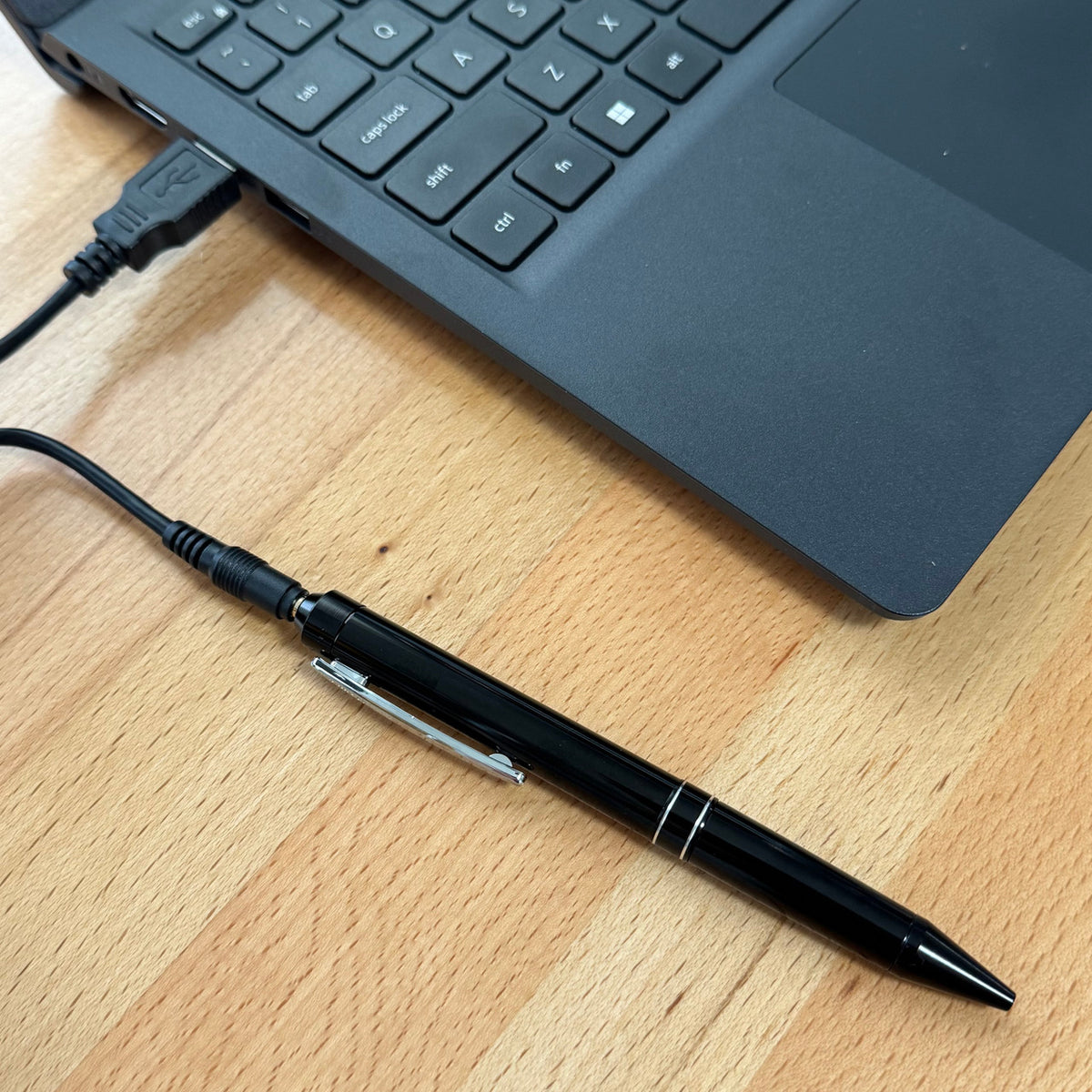 Pen recorder VP-79 shown in hand for size