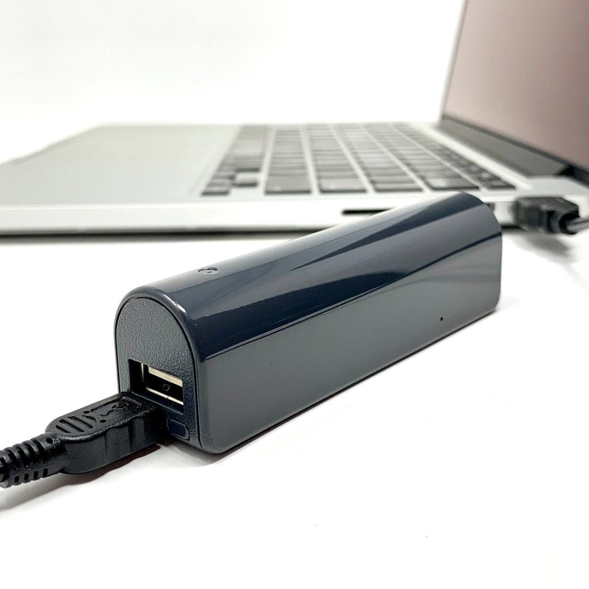Power bank voice activated recorder VR-500 charging a phone as a power bank